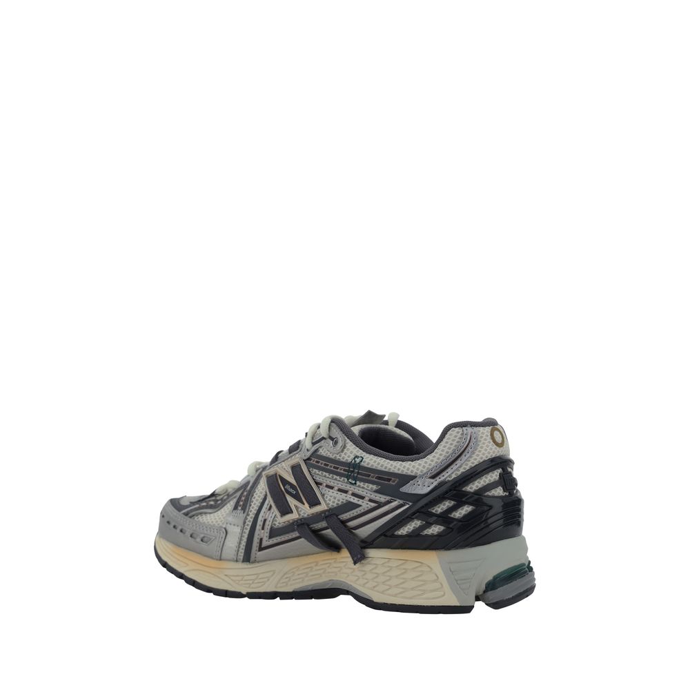 Athletic Sneakers by New Balance for men in fabric mesh silver & monogram showcases an impeccable silhouette, defined by an impeccable athletic style design that perfectly captures the essence of the Men's Athletic Fabric Mesh Sneakers.