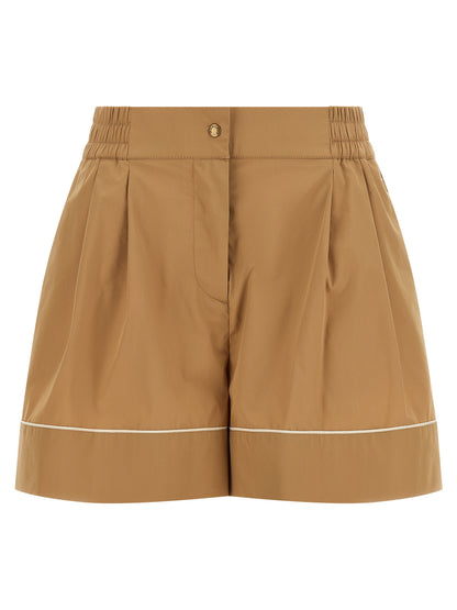 Bermuda Shorts by Moncler for women in cotton & nylon beige features an tailored silhouette, showcasing a tailored flared with a short and high rise for a sophisticated look.