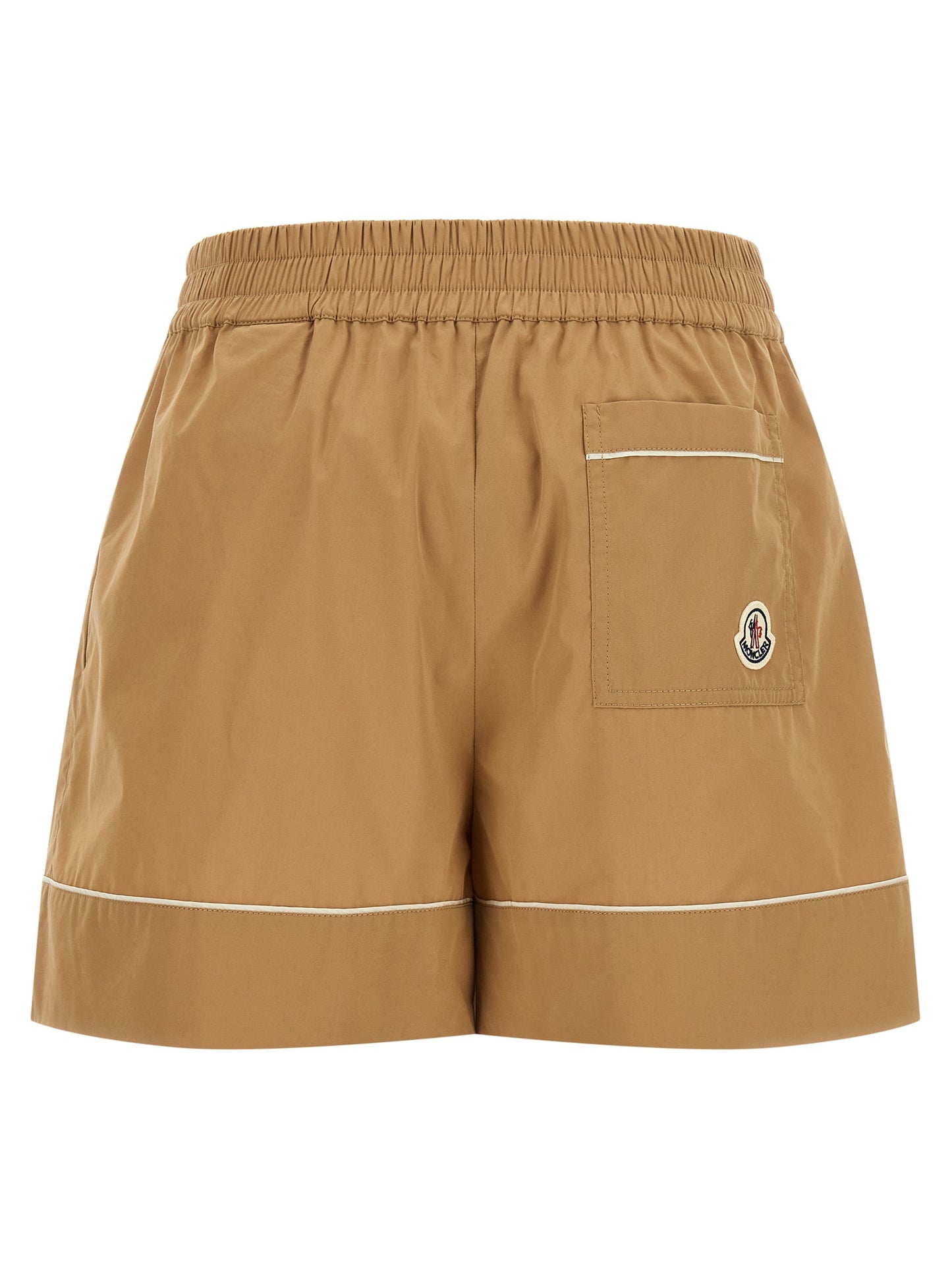 Bermuda Shorts by Moncler for women in cotton & nylon beige presents a contemporary silhouette, showcasing a contemporary flared with a refined short and elegant high rise.