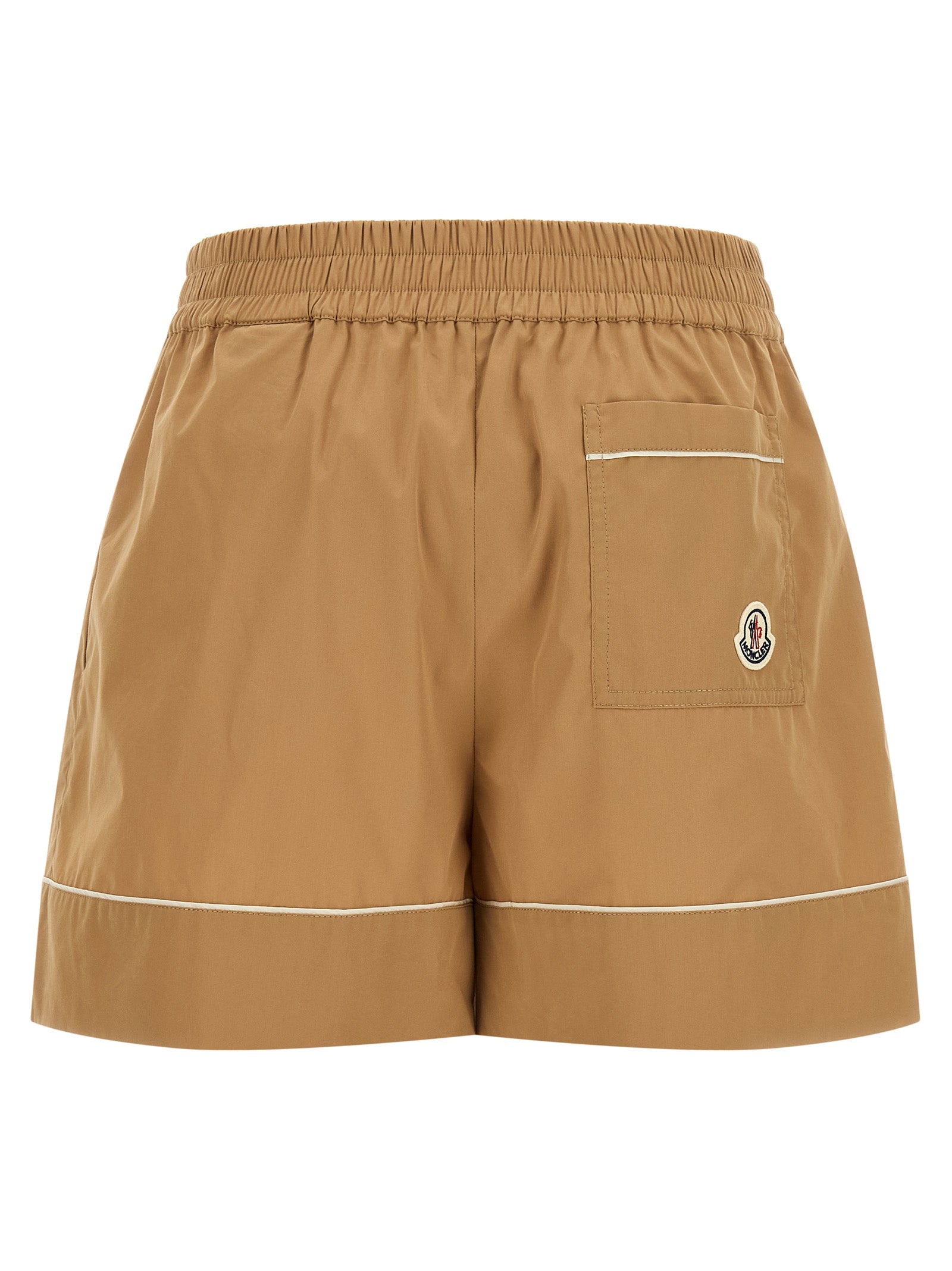 Bermuda Shorts by Moncler for women in cotton & nylon beige presents a contemporary silhouette, showcasing a contemporary flared with a refined short and elegant high rise.