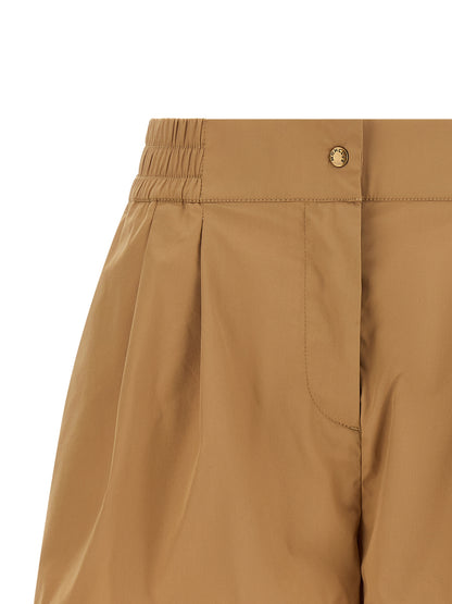 Bermuda Shorts by Moncler for women in cotton & nylon beige showcases a on trend silhouette, featuring a tailored flared with a classic short and sophisticated high rise for a on trend finish.