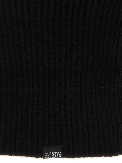 Balaclava by MM6 Maison Margiela for women in polyamide wool black & signature features a riviera-ready silhouette, artfully capturing the essence of the riviera-ready Polyamide Wool Balaclava design for a sophisticated look.