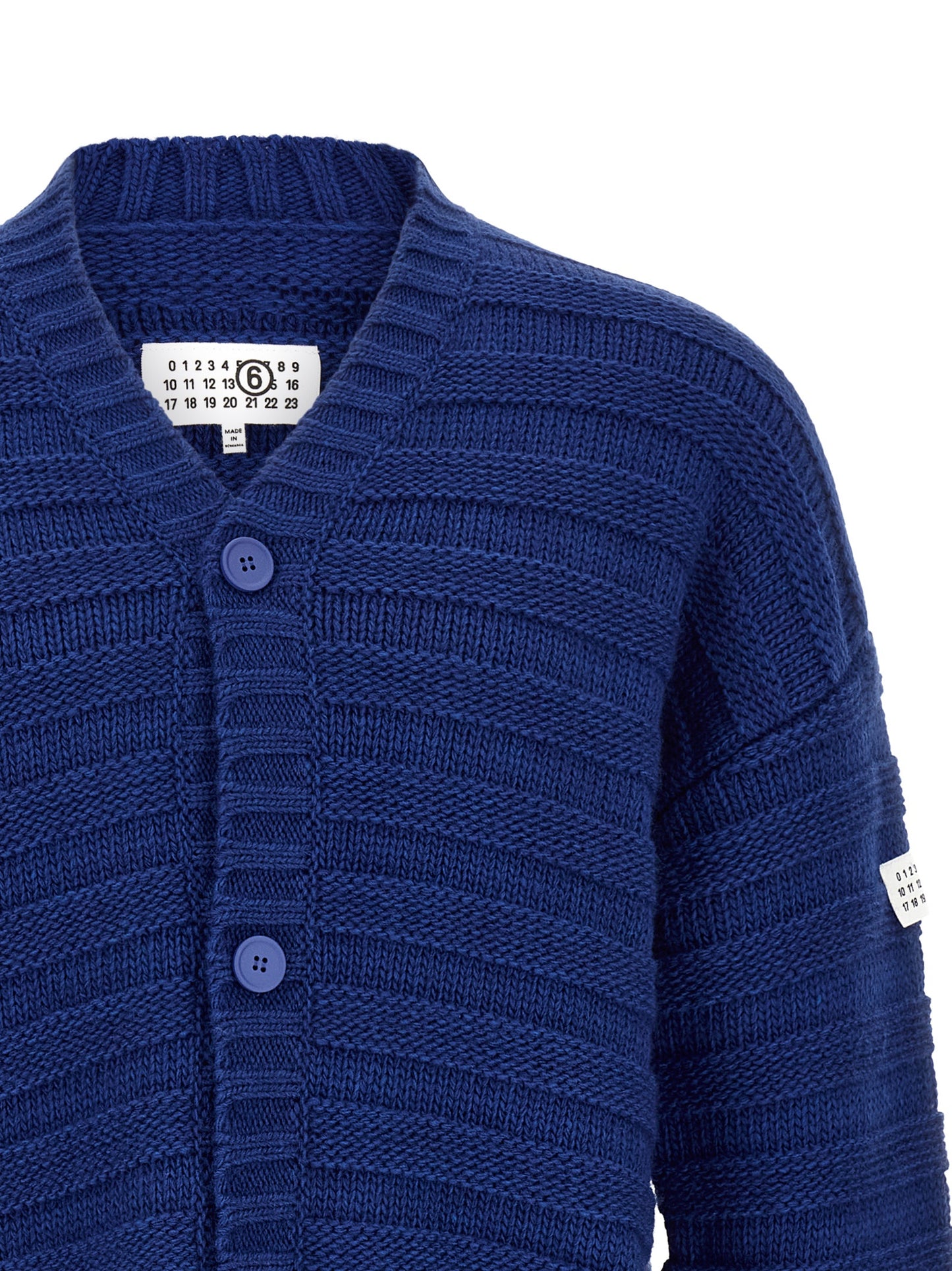 Cardigan by MM6 Maison Margiela for men in acrylic virgin wool blue & signature showcases a luxurious silhouette, meticulously detailed with a sophisticated v-neck neckline and for a refined finish.