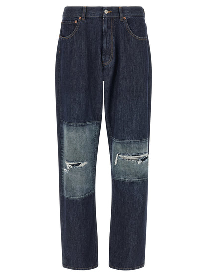 Jeans by MM6 Maison Margiela for men in denim cotton blue, orange, white & patchwork presents a refined pantology silhouette, artfully defined by a refined pantology straight-leg, long, and a sophisticated .