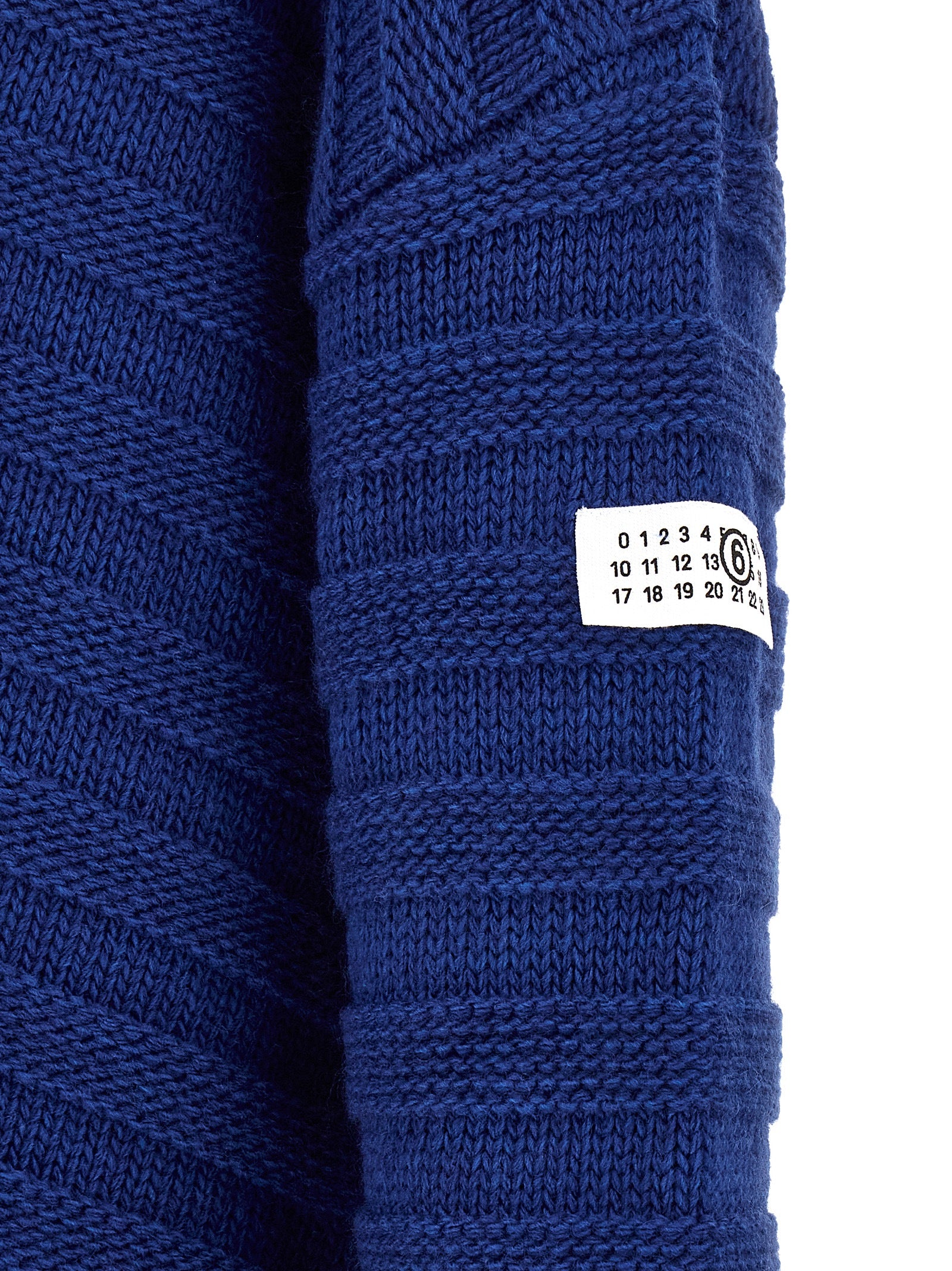 Cardigan by MM6 Maison Margiela for men in acrylic virgin wool blue & signature features a nuanced silhouette with a refined and nuanced detailing for a sophisticated look.