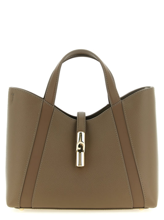 Crossbody Tote Bag by Furla for women in bos taurus suede calf leather gray & gold features an metropolitan chic Goccia Bos Taurus Suede Calf Leather Crossbody Tote Bag design with a secure , metropolitan chic , and versatile crossbody-strap, shoulder-strap, handle, adjustable-strap & detachable-strap for a metropolitan chic look.