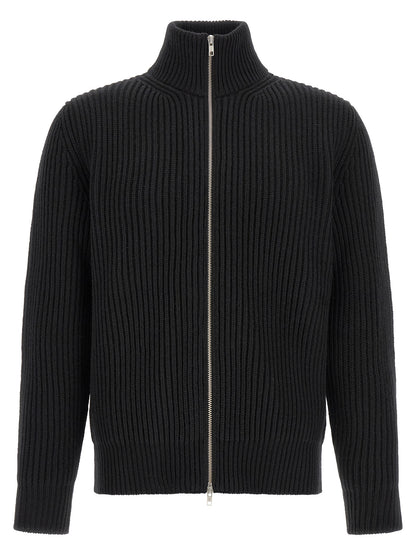 Overcoat by MM6 Maison Margiela for men in polyamide & wool black, silver & white showcases a enveloping silhouette, detailed with distinctive and a enveloping .