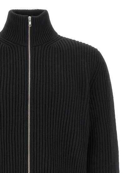 Overcoat by MM6 Maison Margiela for men in polyamide & wool black, silver & white features a cosy chic silhouette, artfully detailed with a sophisticated and premium for a cosy chic finish.