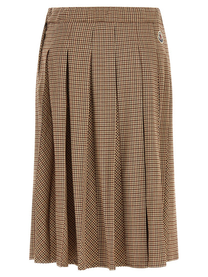 Skirt by Moncler for women in viscose & virgin wool beige, brown, gold & patterned showcases a dramatic silhouette, artfully capturing the essence of the Ribbon Women's Pleated Viscose & Virgin Wool Midi Skirt in a dramatic midi cut for a refined look.