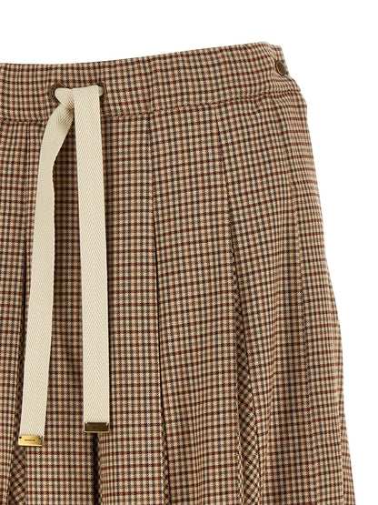 Skirt by Moncler for women in viscose & virgin wool beige, brown, gold & patterned features a contoured silhouette from the Ribbon Women's Pleated Viscose & Virgin Wool Midi Skirt collection, characterized by its contoured midi for a contoured finish.