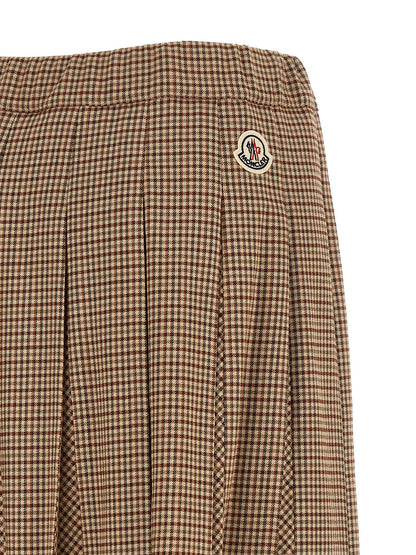 Skirt by Moncler for women in viscose & virgin wool beige, brown, gold & patterned features a sublime silhouette, showcasing the sublime design of the Ribbon Women's Pleated Viscose & Virgin Wool Midi Skirt in a sophisticated midi.