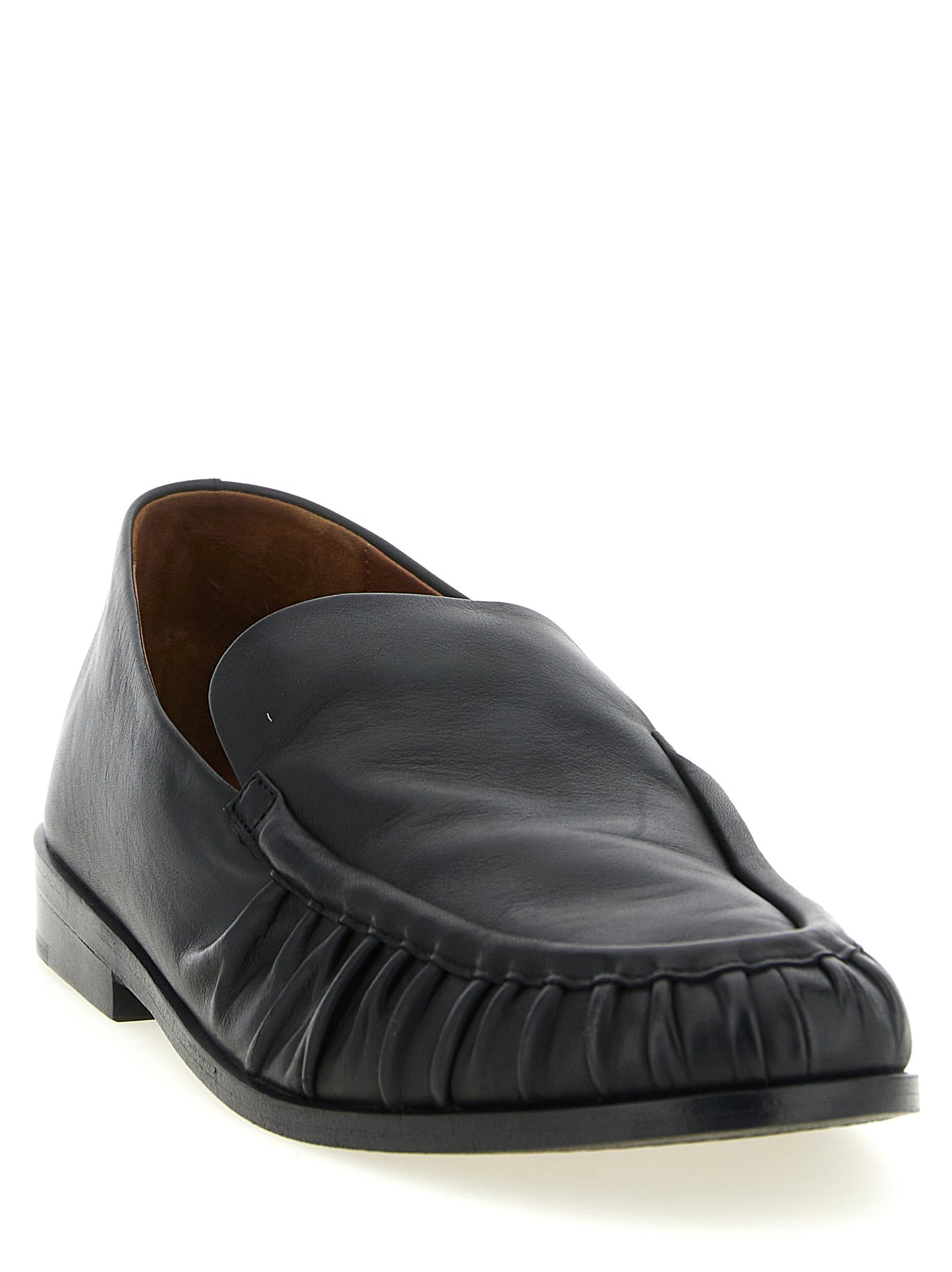 Flat Moccasin Moccasins Loafer Slip-On Shoes by Marsell for men in calfskin leather black & natural showcases a impeccable silhouette as Men's Calfskin Leather Flat Moccasin Moccasins Loafer Slip-On Shoes, artfully designed with a impeccable flat and refined for a impeccable finish.