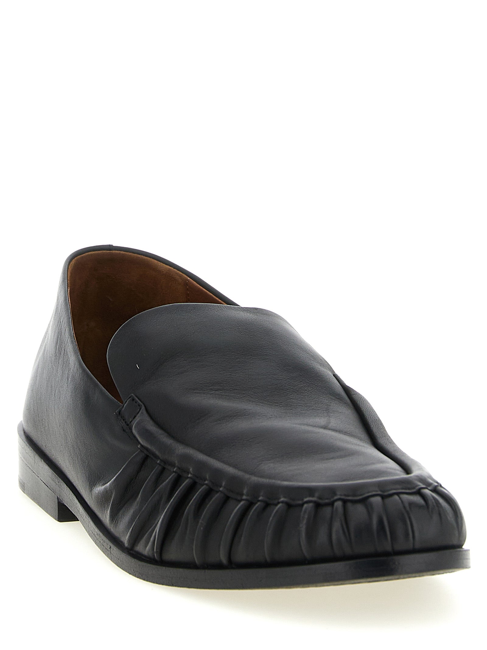 Flat Moccasin Moccasins Loafer Slip-On Shoes by Marsell for men in calfskin leather black & natural showcases a impeccable silhouette as Men's Calfskin Leather Flat Moccasin Moccasins Loafer Slip-On Shoes, artfully designed with a impeccable flat and refined for a impeccable finish.