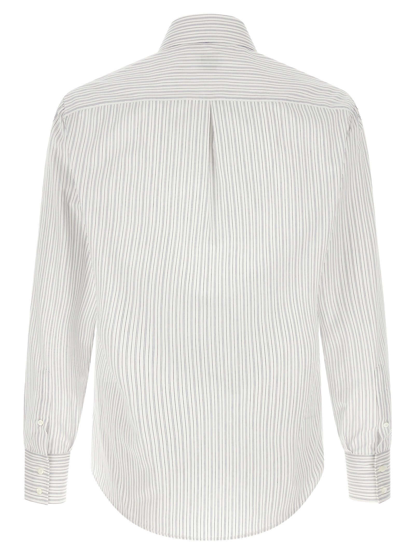 Shirt by Brunello Cucinelli for men in cotton blue & striped showcases a sharp silhouette, elegantly detailed with a sharp and sharp .