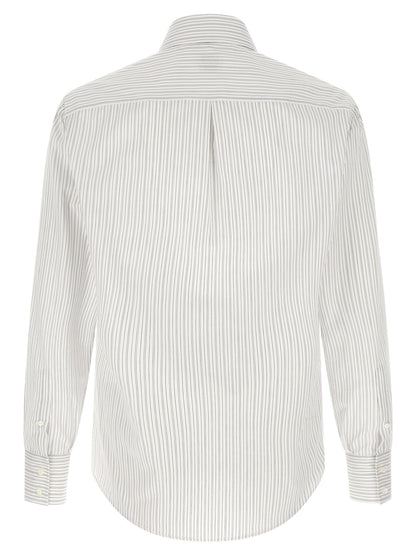 Shirt by Brunello Cucinelli for men in cotton blue & striped showcases a sharp silhouette, elegantly detailed with a sharp and sharp .