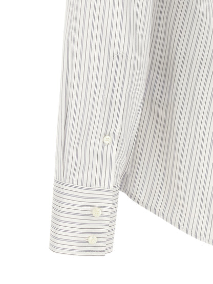 Shirt by Brunello Cucinelli for men in cotton blue & striped showcases a sharp silhouette, elegantly detailed with a sharp and sharp .