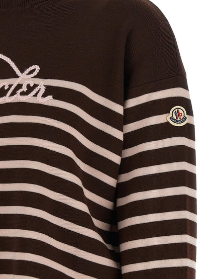 Cardigan by Moncler for women in virgin wool felt brown, pink, white & striped showcases a captivating silhouette, artfully detailed with a captivating and for a truly sophisticated captivating look.