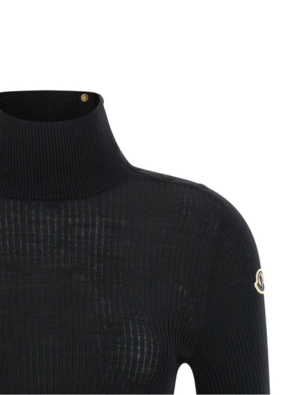 Cardigan by Moncler for women in virgin wool felt black, gold & striped showcases a captivating silhouette, artfully detailed with a captivating and turtle high-neck neckline for a truly sophisticated captivating look.
