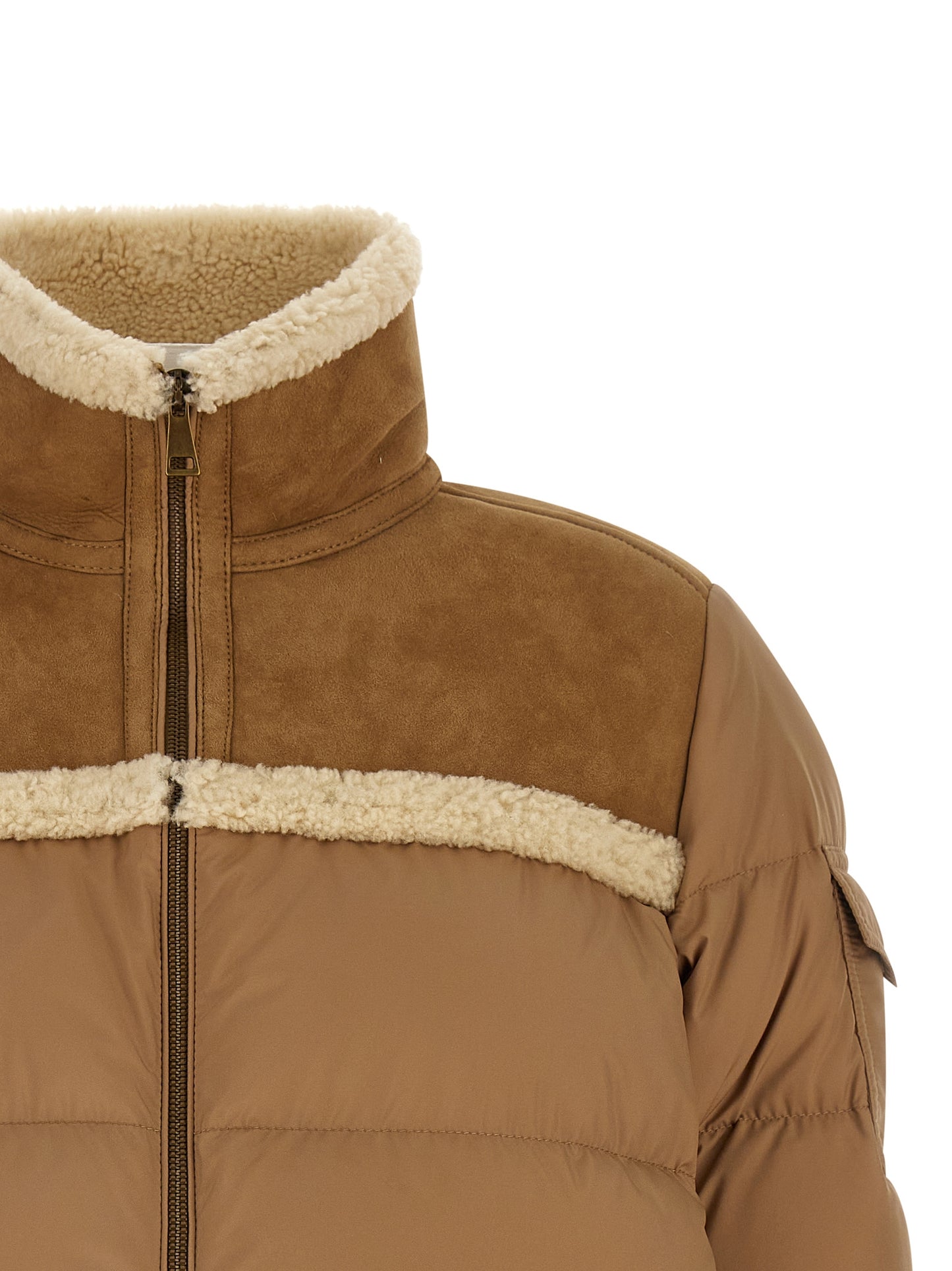 Puffer Jacket by Moncler for women in polyester suede leather beige showcases a bohemian silhouette, artfully detailed with a bohemian high-neck neckline and signature pockets & insulated for a truly bohemian finish.