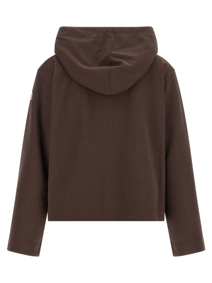 Sweatshirt Hoodie by Moncler for women in polyamide & cotton brown & signature features a slouchy chic silhouette, detailed with a slouchy chic and a signature hooded neckline for an elevated aesthetic.