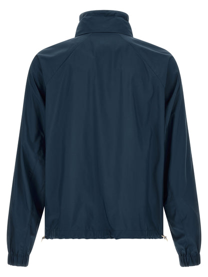 Overcoat by Brunello Cucinelli for men in polyester & nylon navy features a contemporary silhouette showcasing a contemporary and refined lightweight & pockets for a sophisticated finish.