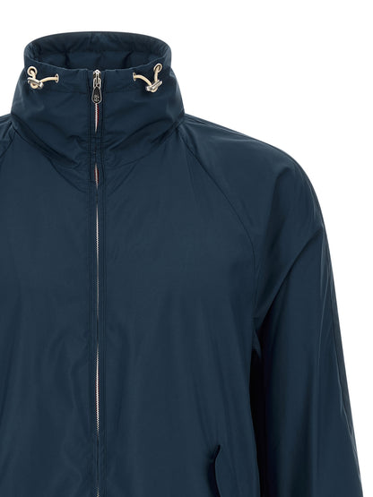 Overcoat by Brunello Cucinelli for men in polyester & nylon navy presents a luxurious silhouette, showcasing a luxurious and sophisticated lightweight & pockets for a premium, luxurious look.