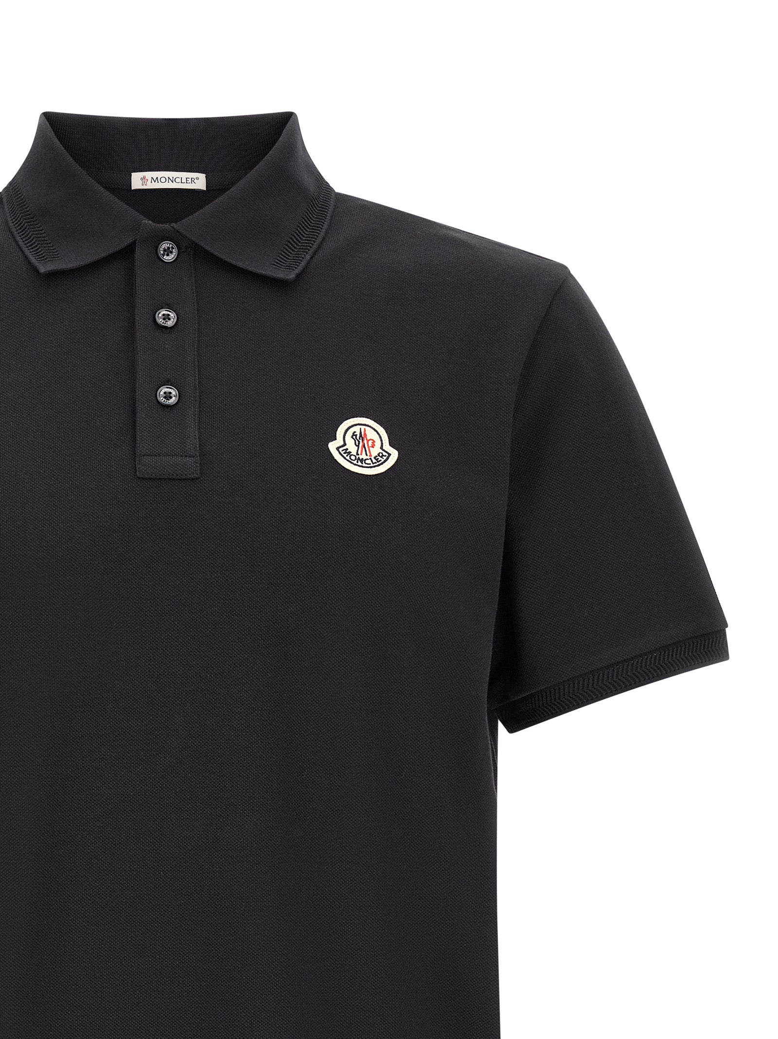 Polo Shirt by Moncler for men in cotton felt blue presents a sleek silhouette, featuring a refined and for a sleek finish.
