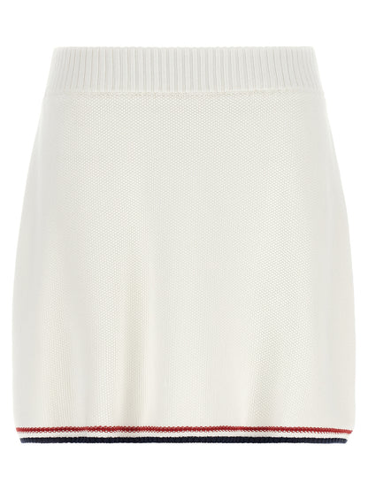 Skirt by Brunello Cucinelli for women in cotton navy, red, white & striped features a contoured silhouette from the Women's Cotton Mini Long Skirt collection, characterized by its contoured mini long for a contoured finish.