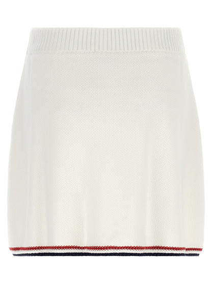 Skirt by Brunello Cucinelli for women in cotton navy, red, white & striped features a captivating silhouette, showcasing the captivating Women's Cotton Mini Long Skirt design with a sophisticated mini long for a captivating look.