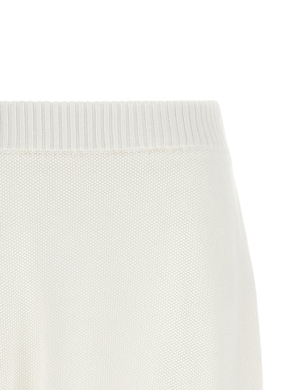 Skirt by Brunello Cucinelli for women in cotton navy, red, white & striped showcases a sultry silhouette, elegantly defined by its mini long and the sophisticated sultry design of the Women's Cotton Mini Long Skirt.