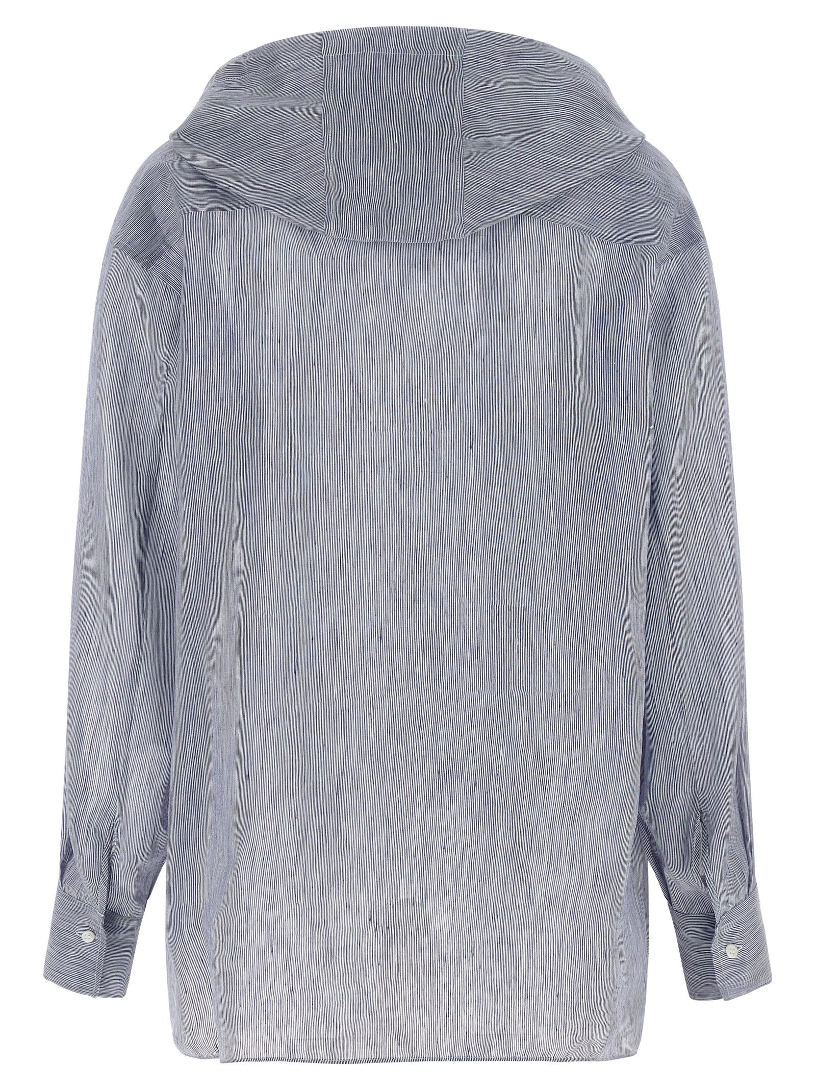 Hooded Blouse by Brunello Cucinelli for women in linen & silk light-blue & striped showcases a sleek silhouette, elegantly detailed with a sleek hooded neckline and for a sleek finish.
