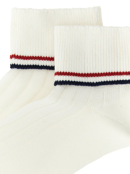 These Socks by Brunello Cucinelli for women in cotton navy, red, white & striped present a utilitarian silhouette from the Essence Women's Cotton Socks collection, offering a utilitarian fit and refined aesthetic.