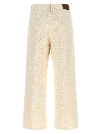 Trousers by Brunello Cucinelli for women in cotton denim beige, brown, gold & ivory features a sculptural silhouette, showcasing a sculptural straight-leg & cropped and cropped with a sophisticated high rise for a sculptural finish.