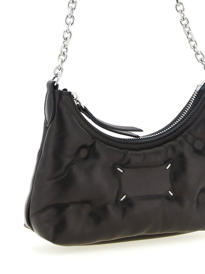 Micro Quilted 2-in-1 Shoulder & Crossbody Hobo Handbag by Maison Margiela for women in lamb leather black & silver features an multi-faceted design with a secure zipper, ample , and versatile crossbody-strap & shoulder-strap for a multi-faceted finish.