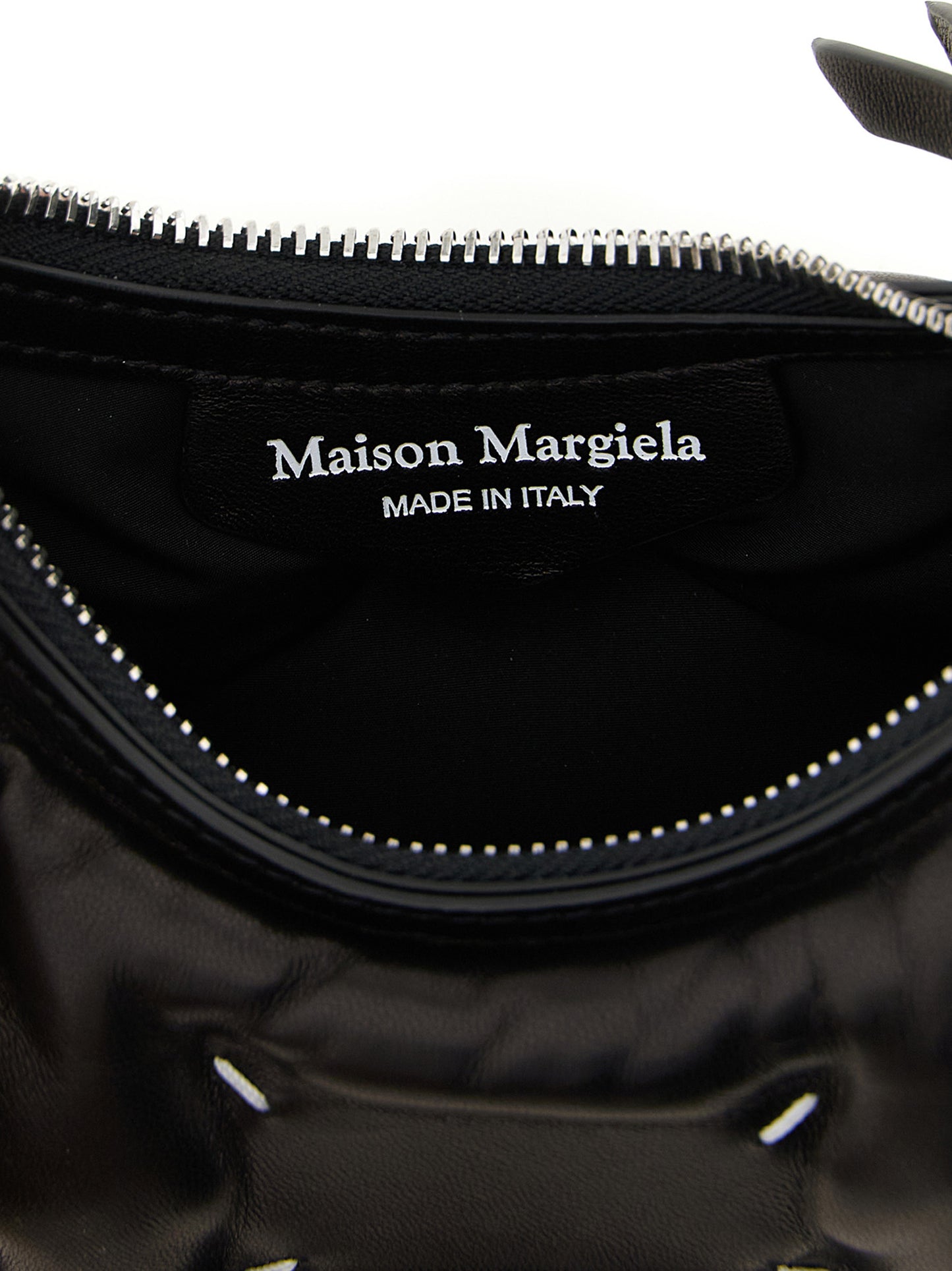 Micro Quilted 2-in-1 Shoulder & Crossbody Hobo Handbag by Maison Margiela for women in lamb leather black & silver features an versatile silhouette, showcasing a secure zipper and versatile with versatile crossbody-strap & shoulder-strap for a versatile finish.