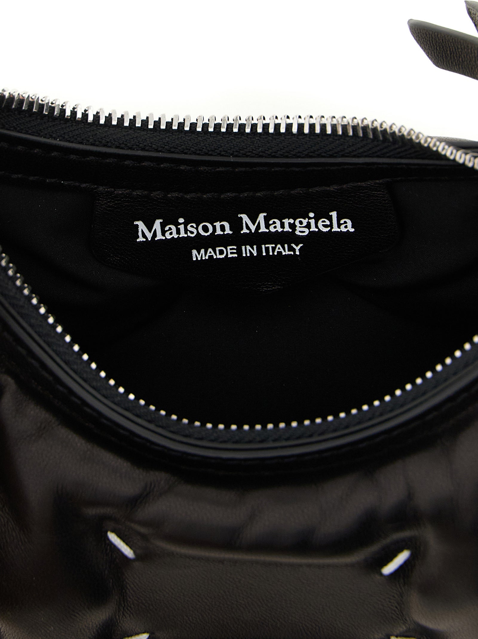 Micro Quilted 2-in-1 Shoulder & Crossbody Hobo Handbag by Maison Margiela for women in lamb leather black & silver features an versatile silhouette, showcasing a secure zipper and versatile with versatile crossbody-strap & shoulder-strap for a versatile finish.