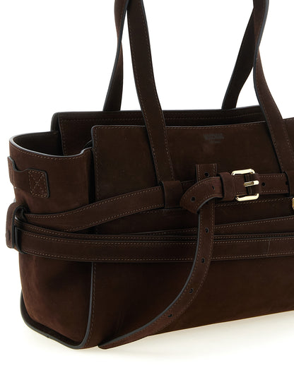 This Handbag by Moschino for women in calfskin leather and brown & gold presents a sculptural silhouette featuring a secure zipper & buckle, ample , and versatile shoulder-strap, handle & belt-strap for a sculptural finish.