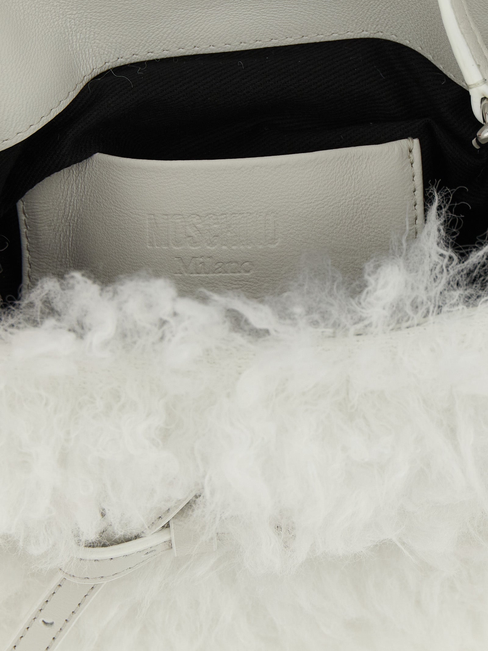 Small Handbag by Moschino for women in leather & velvet silver & white features a ornamental silhouette, showcasing a secure buckle, ample , and ornamental shoulder-strap, handle, adjustable-strap & belt-strap for a sophisticated look.