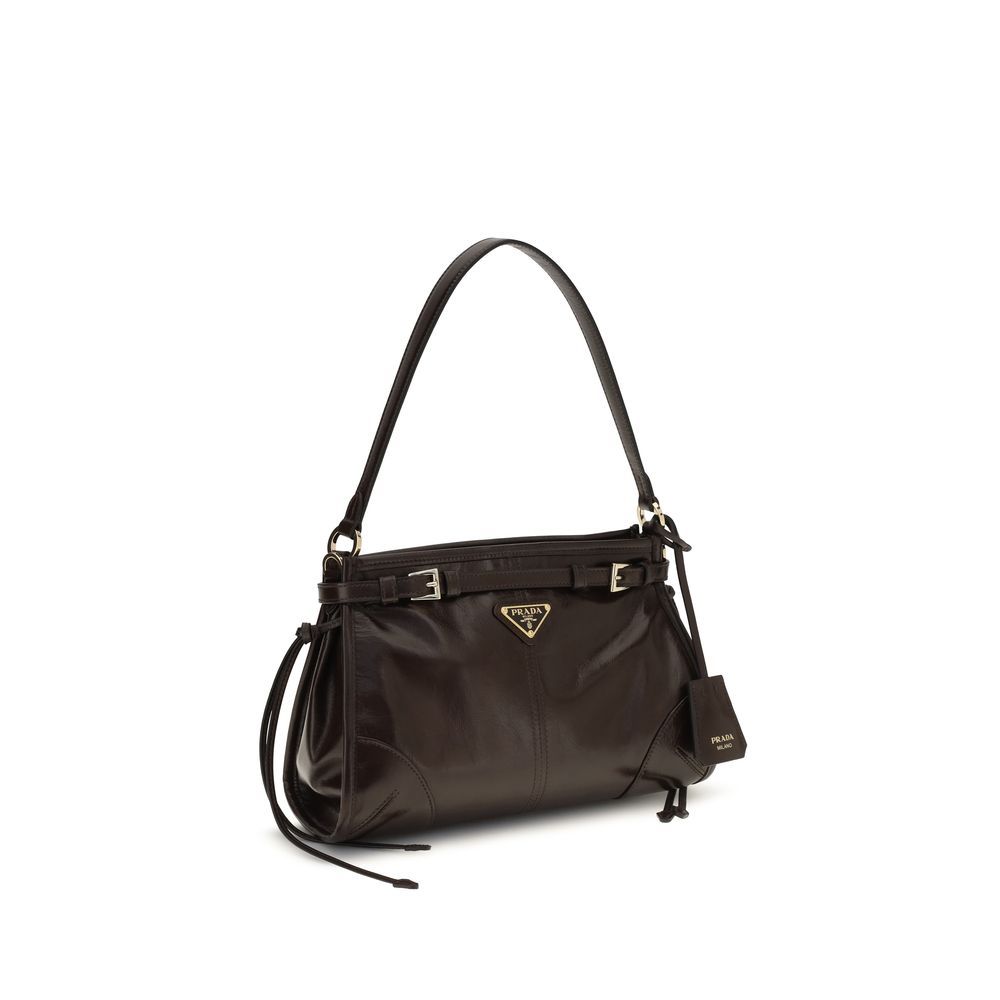 Mini Hobo Handbag by Prada for women in polyurethane nylon & bos taurus calf leather brown & signature presents a ornamental silhouette, showcasing a secure zipper, ample , and versatile shoulder-strap, handle, adjustable-strap, detachable-strap & belt-strap for a ornamental finish.