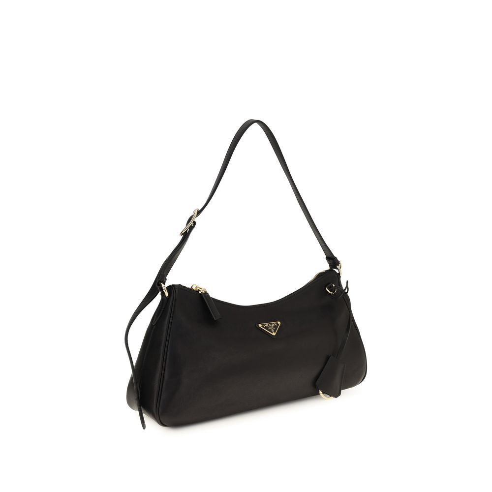 2-in-1 Shoulder & Crossbody Bag by Prada for women in polyurethane & bos taurus nappa calf leather black & natural features a enviable silhouette, showcasing a secure zipper, ample , and enviable crossbody-strap & shoulder-strap for a enviable finish.