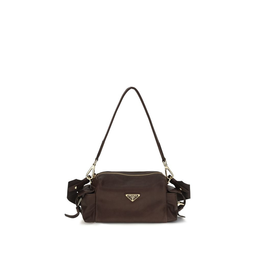 Shoulder Flap Bag by Prada for women in nylon polyurethane & bos taurus nappa leather brown features an effortlessly chic silhouette with a secure flap, zipper & buckle, ample , and versatile shoulder-strap, adjustable-strap & detachable-strap for effortlessly chic everyday luxury.