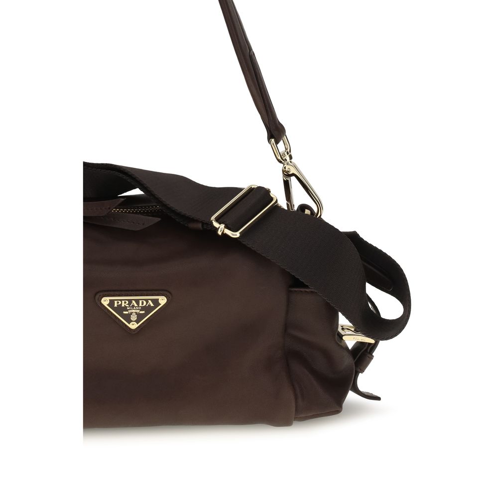 Shoulder Flap Bag by Prada for women in nylon polyurethane & bos taurus nappa leather brown features a effortless chic silhouette with a secure flap, zipper & buckle, ample , and versatile shoulder-strap, adjustable-strap & detachable-strap for a effortless chic finish.