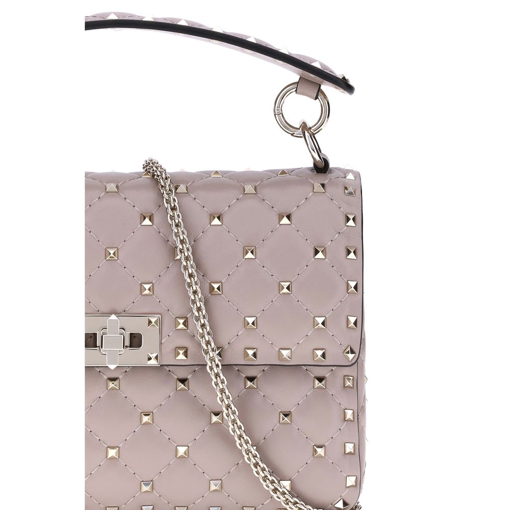 Small Quilted Crossbody Flap Handbag by Valentino Garavani for women in nappa leather multicolor & signature features a signature silhouette, showcasing a secure flap and signature with versatile crossbody-strap, adjustable-strap & handle for a sophisticated look.