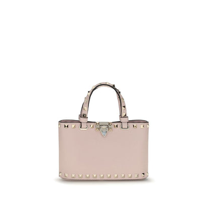 This Mini Crossbody Travel Satchel Handbag by Valentino Garavani for women in bos taurus calfskin leather and multicolor & signature presents a sculptural silhouette featuring a secure hook, ample , and versatile crossbody-strap & handle for a sculptural finish.