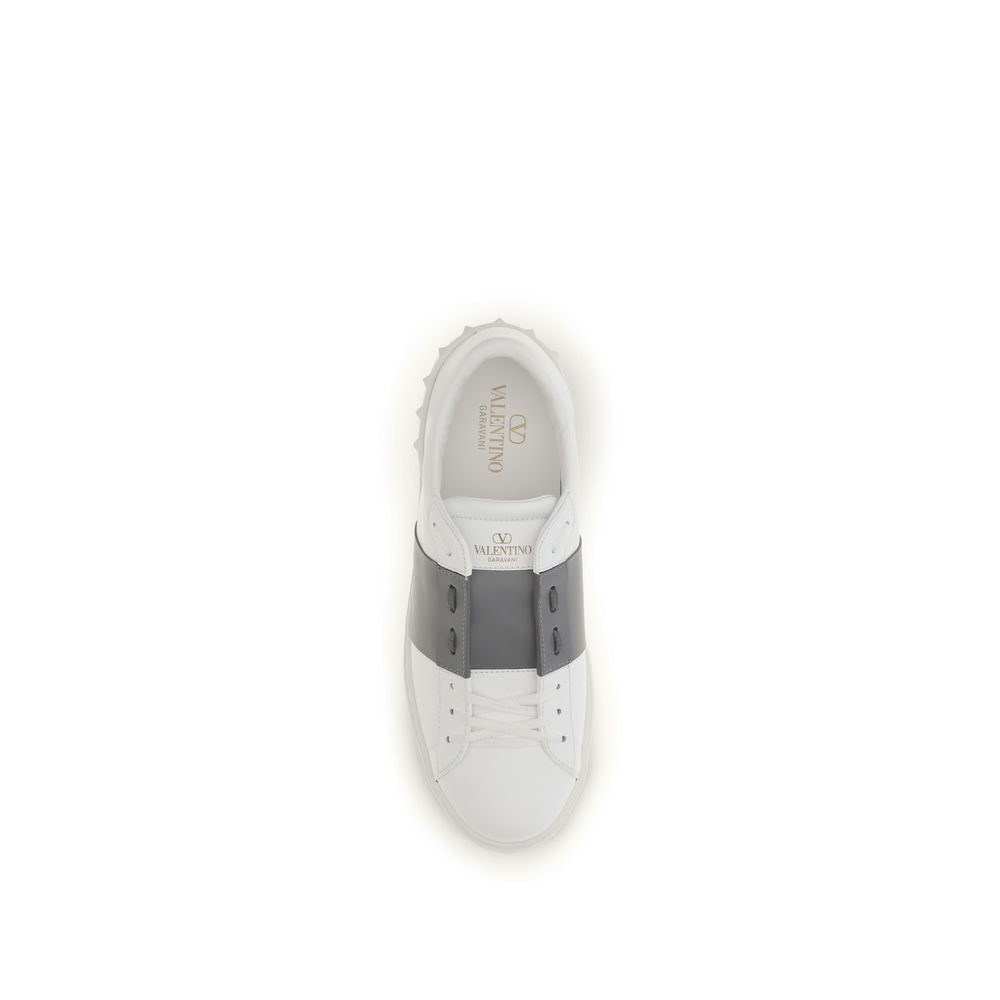 Sneakers by Valentino Garavani for men in bos taurus calf leather silver presents a sumptuous silhouette, artfully capturing the essence of the Men's Low Top Slip On Bos Taurus Calf Leather Sneakers with its sumptuous low-top slip-on style design.