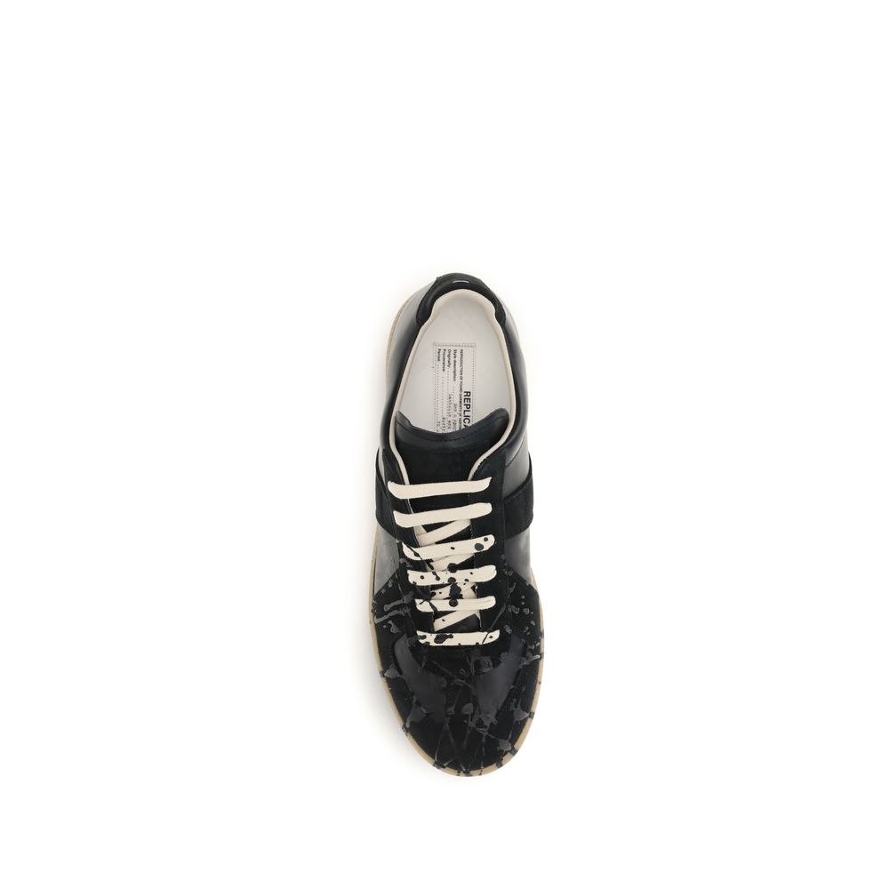 Athletic Sneakers by Maison Margiela for men in bos taurus calf suede leather black & signature presents a sleek silhouette, perfectly capturing the athletic style essence of Men's Athletic Bos Taurus Calf Suede Leather Sneakers with its sleek design and premium finish.