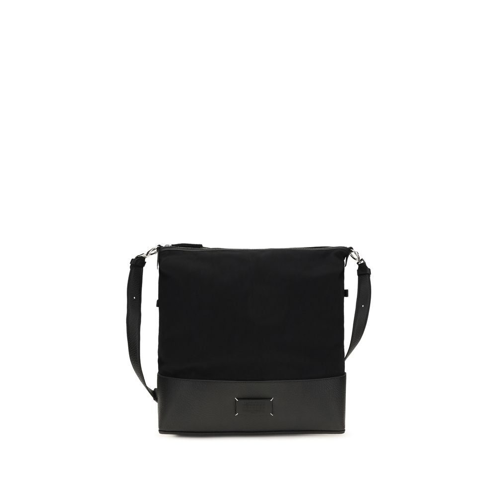 Medium Shoulder Hobo Bag by Maison Margiela for men in bos taurus calf leather black features a effortless chic silhouette with a secure zipper, ample , and versatile shoulder-strap & adjustable-strap for a effortless chic finish.