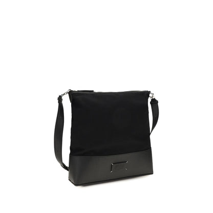 Medium Shoulder Hobo Bag by Maison Margiela for men in bos taurus calf leather black features an effortlessly chic silhouette with a secure zipper, ample , and versatile shoulder-strap & adjustable-strap for effortlessly chic everyday luxury.