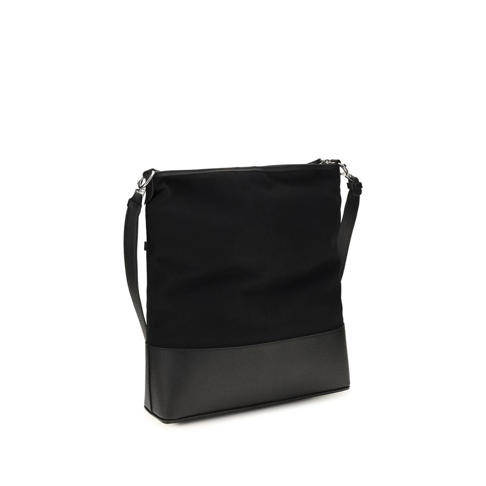 Medium Shoulder Hobo Bag by Maison Margiela for men in bos taurus calf leather black showcases a enviable silhouette, artfully detailed with a secure zipper, organized , and versatile shoulder-strap & adjustable-strap for a enviable look.