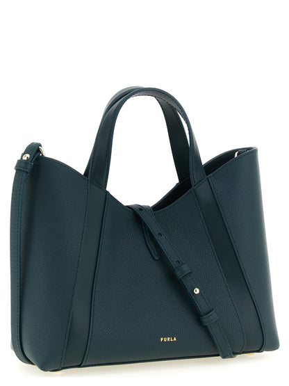 Tote Bag by Furla for women in calfskin leather & cotton bicolour, gold, green & teal features an jet-set Goccia Calfskin Leather & Cotton Tote Bag design with a secure zipper, ample , and versatile handle & adjustable-strap for an jet-set finish.